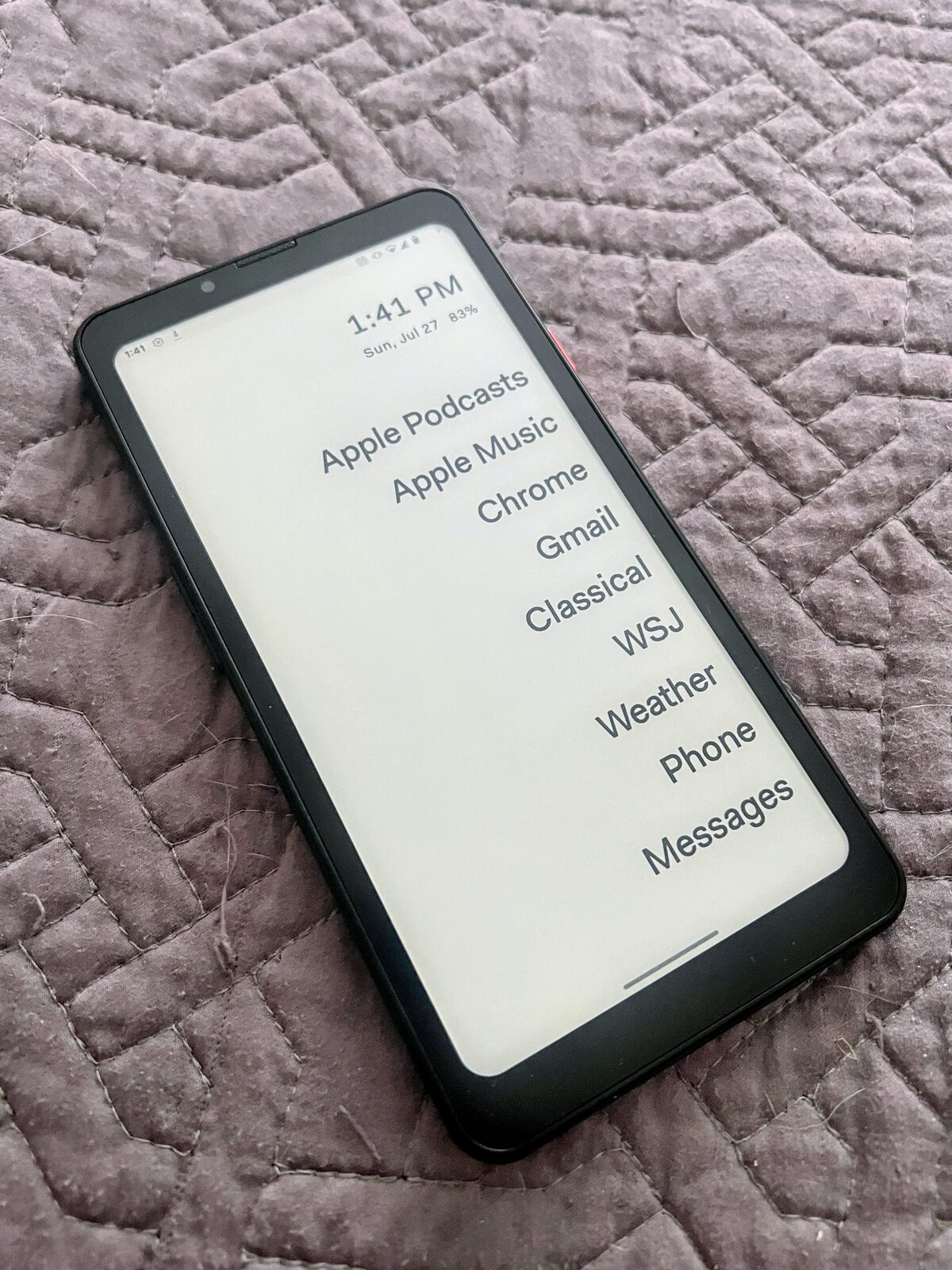 The Bigme HiBreak Pro, showing a text-only e-ink home screen listing Apple Podcasts, Apple Music, Chrome, Gmail, Classical, WSJ, Weather, Phone, and Messages