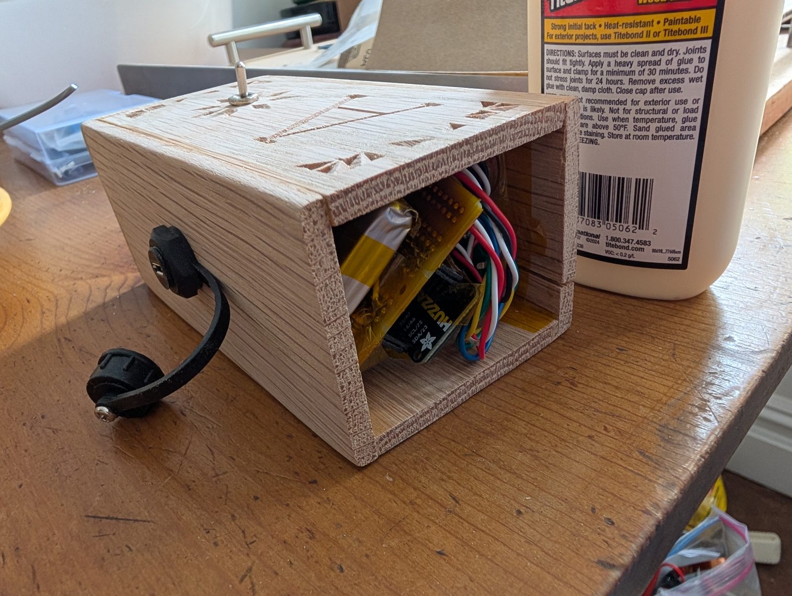 Electronics stuffed into the glued-up oak box