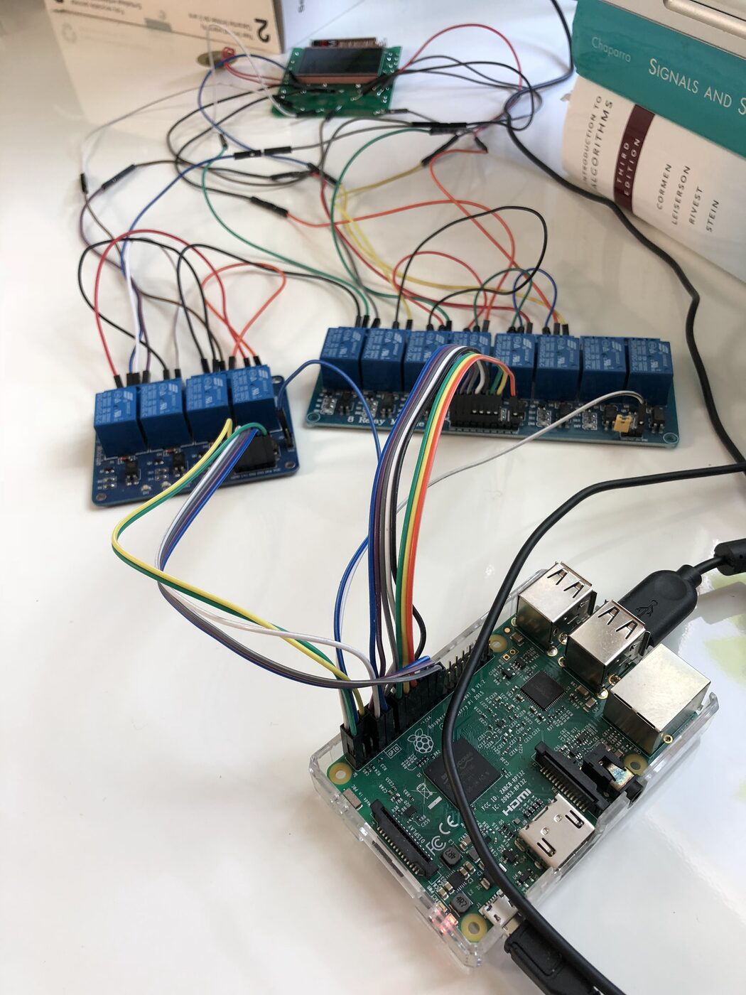 Raspberry Pi, relay boards, camera, and the wired handheld on the test bench